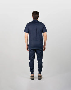 uniformes medicos hombre espalda modelo mao denim
